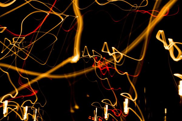 Abstract flow of golden light representing energy